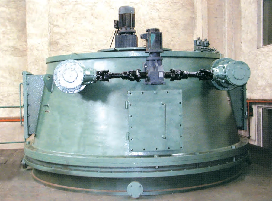 Bell-less top chute drive unit